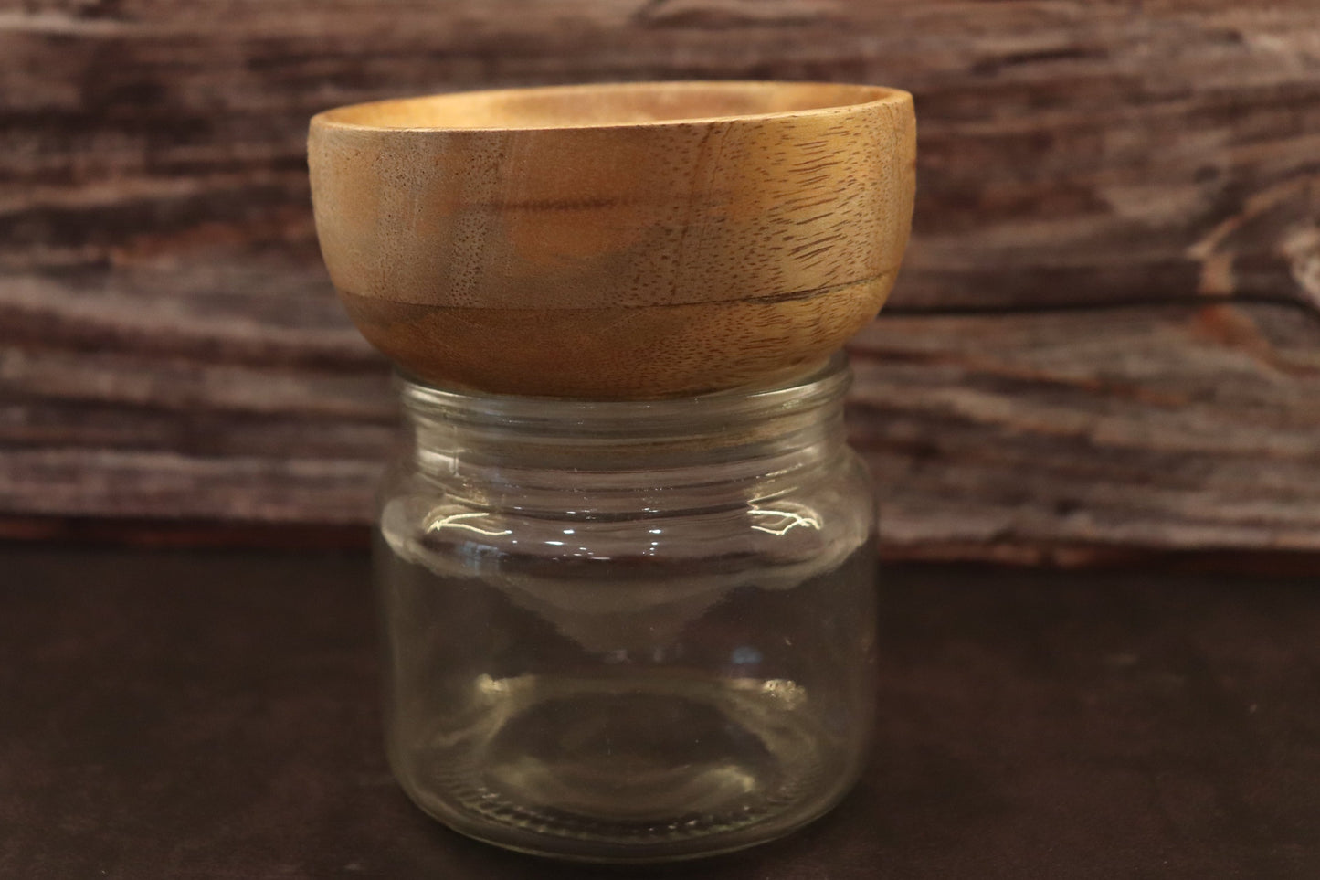 Glass Jar with a wooden bowl cover