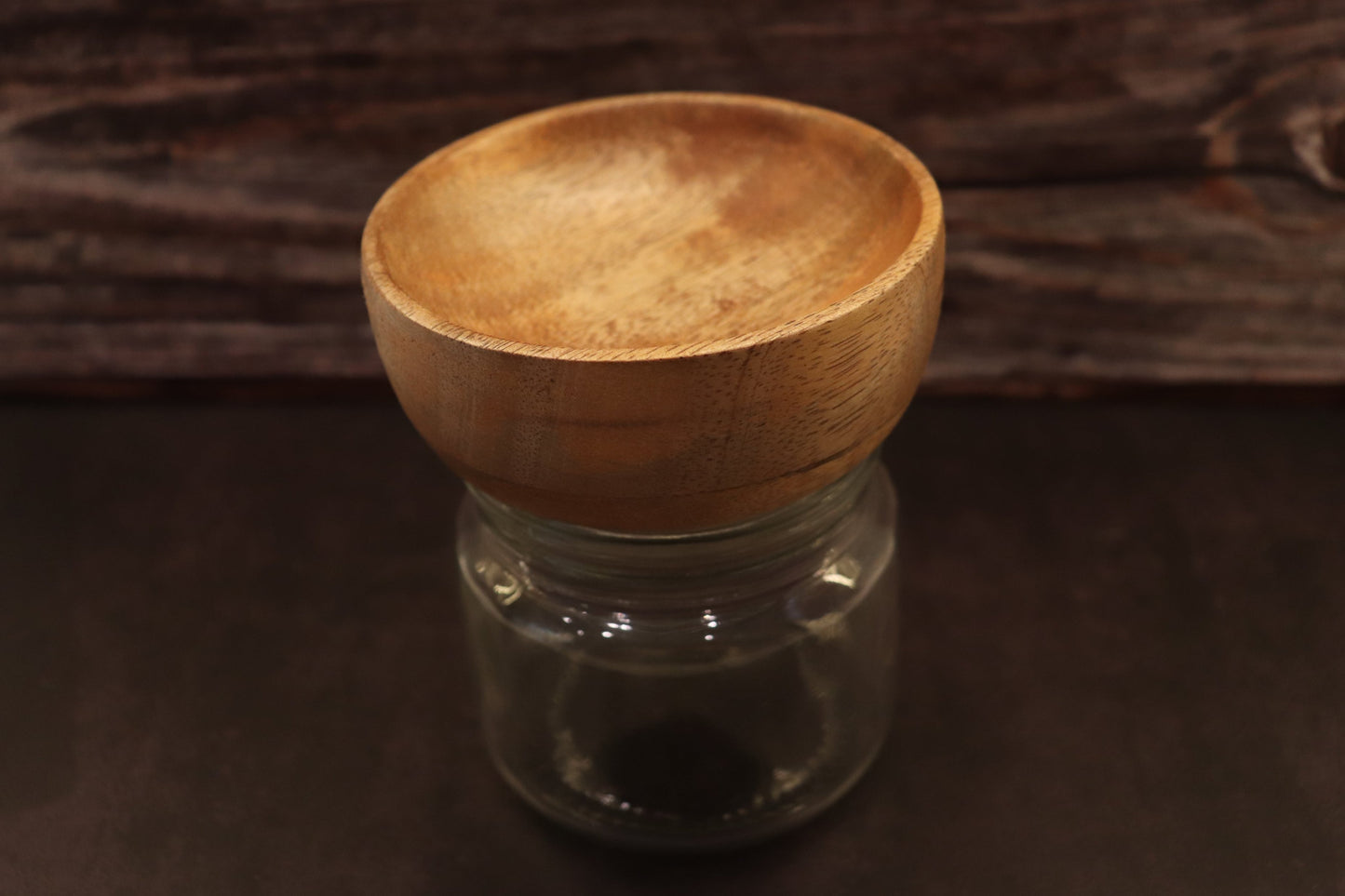 Glass Jar with a wooden bowl cover